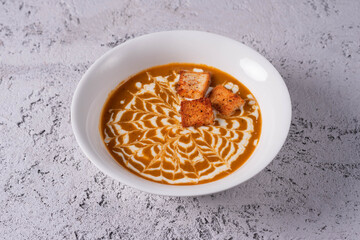 lentil soup. on light concrete