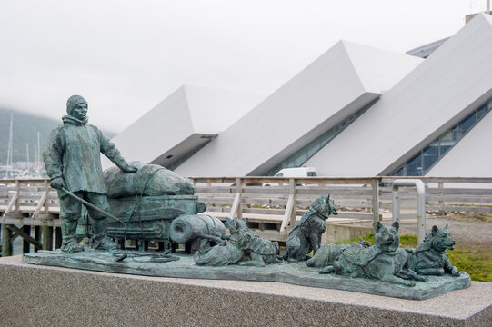 Tromso, Norway. 01.05.2015Statue to Helmer Hassen next to the museumShip MS Polstjerna,
