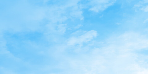 Abstract clear view of natural cloudy sky of winter seasons, Cloudy and bright shinny blue sky background with white clouds, fluffy and blurry summer sky background for wallpaper and design.