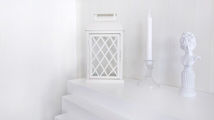 Composition with a candlestick a lantern and a statuette