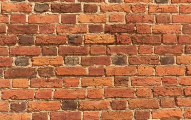 Ancient brickwork. Red brick background. Old red brick wall.