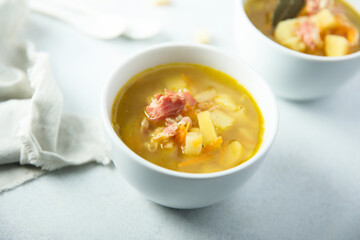 Homemade pea soup with smoked bacon