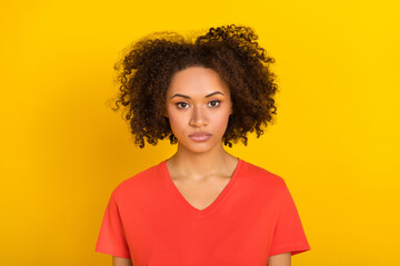 Photo of pretty focused lady look camera isolated on bright yellow color background
