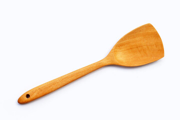 Wooden kitchen spatula on white background.
