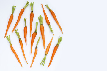 Fresh carrots on white background.