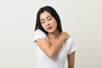 Asian woman has problem with structural posture She had neck and shoulder pain. She massaged her neck and shoulders for relief. reduce muscle tension. Standing on isolated white background