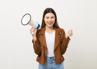 Shout out loud with megaphone. Young beautiful mixed race woman  announces with a voice about...