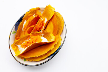 Thai crispy pancakes on white background.