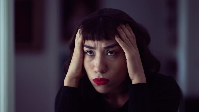 Young woman suffering alone with negative emotion closeup face. Girl in bad mental state of mind