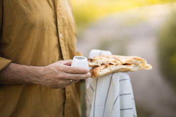 The process of breaking bread. Religious tradition of breaking bread. Bread and wine. Preparation...