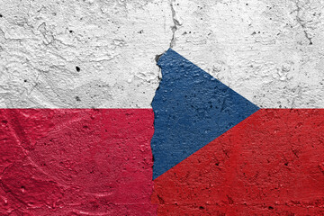 Poland and Hungary - Cracked concrete wall painted with a Polish flag on the left and a Hungary flag on the right stock photo