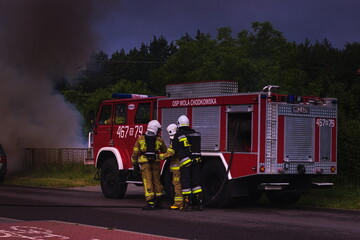 car on fire, rescue operation of the fire brigade