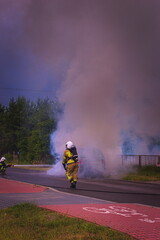 car on fire, rescue operation of the fire brigade