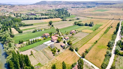 Fototapeta na wymiar Aerial view of the farmhouse in the countryside 