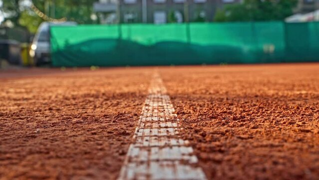 Tennis Ball Rolling To A Stop And Pickup By A Hand