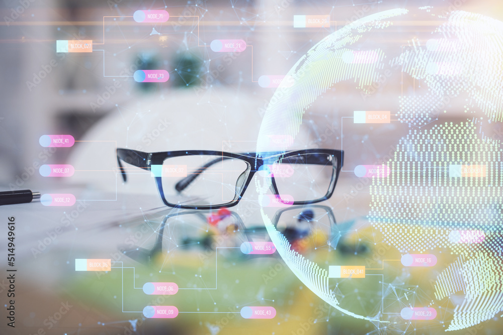 Poster map hologram with glasses on the table background. concept of globalization. double exposure.