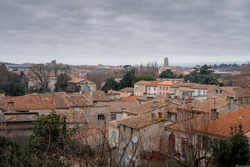 Obraz premium View over the orange tiled rooftops of Carcassonne with an overcast sky