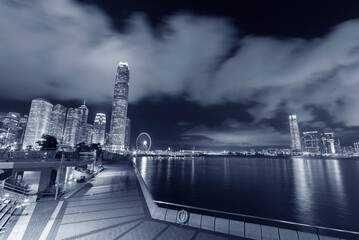 Fototapeta premium Panorama of skyline of Victoria Harbor of Hong Kong city at night