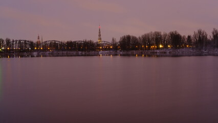 Fototapeta na wymiar Spring sunrise in old Riga over the Daugava