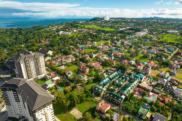Tagaytay, Cavite, Philippines - Aerial of luxury condominiums and upscale houses near the ridge.