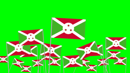 Hand hold Burundi flag isolated on green screen concept showing unity of nation. © SC studio 