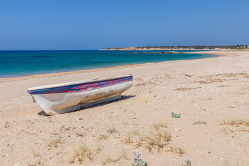 Boat on the beach at Naxos. Cyclades Islands.Greece.