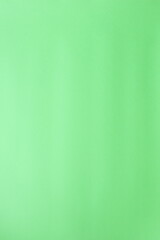 Fototapeta premium Green paper background, colorful surface
