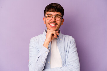 Young caucasian man isolated on purple background smiling happy and confident, touching chin with hand.