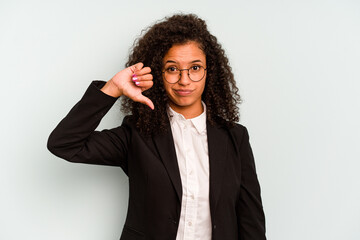 Young business Brazilian woman isolated on white background showing a dislike gesture, thumbs down....
