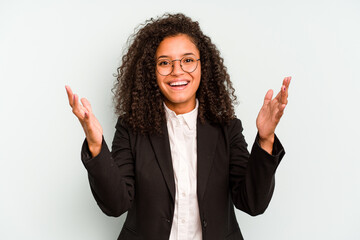 Young business Brazilian woman isolated on white background receiving a pleasant surprise, excited...