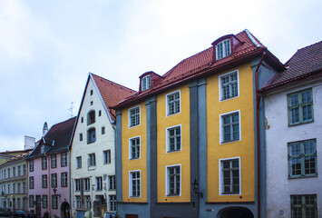Fototapeta na wymiar Vintage buildings on the Long Street (Pikk Street) in old town of Tallinn, Estonia