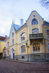 Fototapeta na wymiar Vintage buildings on the Long Street (Pikk Street) in old town of Tallinn