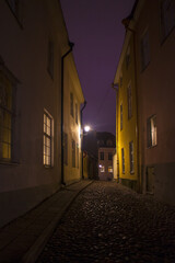 Fototapeta na wymiar Evening street of Old Town in Tallinn, Estonia