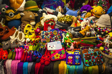 Fototapeta na wymiar Traditional Estonian felt souvenirs stand on a counter of Tallinn Christmas market, Estonia