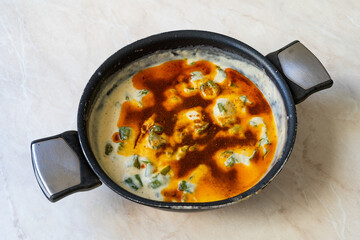 Roasted Green Pepper with Milk in Pan. Traditional Turkish Food. Sutlu Biber Kavurması.