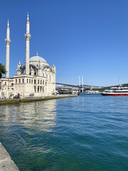 Fototapeta na wymiar ISTANBUL, TURKEY: Ortakoy Mosque in Besiktas, Istanbul, Turkey, is situated at the waterside of the Ortakoy pier square, one of the most popular locations on the Bosphorus.