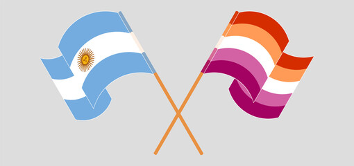 Crossed and waving flags of Argentina and Lesbian Pride