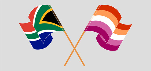 Crossed and waving flags of South Africa and Lesbian Pride