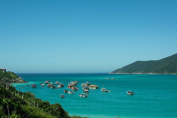 Fototapeta na wymiar landscape with hills, sea and boats in brazil
