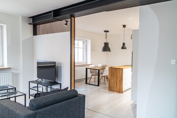 Modern apartment. View from the living room to the kitchen and dining room