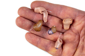 In-ear-invisible hearing aids solution in doctor hand