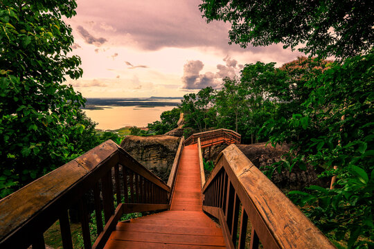 Background of wooden walkways (wooden bridges) created for high-angle views on mountains, natural attractions, or parks that have forest preservation © bangprik