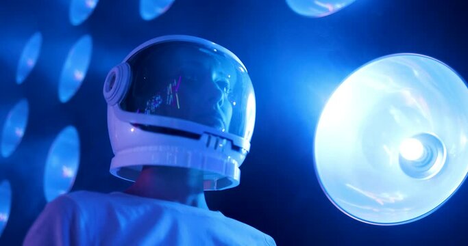 Female astronaut wearing space helmet in metaverse