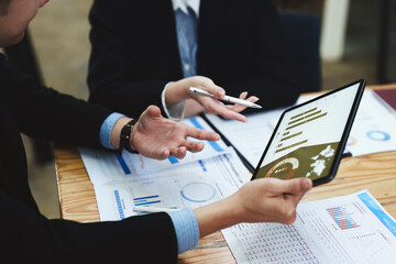 business people working together on a new project to analyze budgets and manage investment risks in...