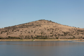 fresh water in the morning next to a mountain horizontal scene