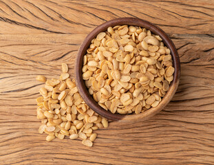 Fried soy beans snack in a bowl over wooden table