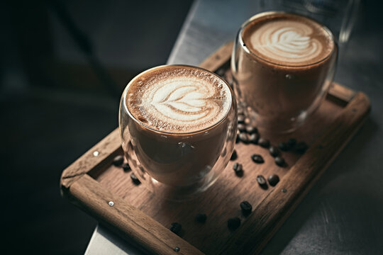 Selective focus cup of hot latte art coffee