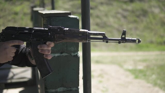 Assault rifle AK-74 single shot close-up at the shooting range
