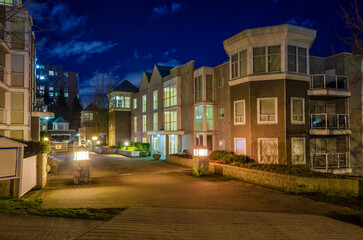 Luxury house with big tree and nice landscape at night in Vancouver, Canada, North America. Night time on May 2022