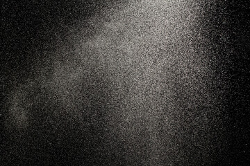 Sprayed water. Small droplets of water in the air. Lots of water drops, isolated on black background. - 514997691